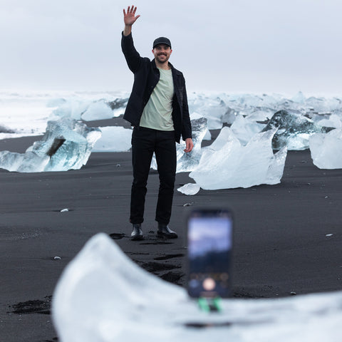 Taking a picture with an iPhone on a Pocket Tripod on a chunk of ice in iceland